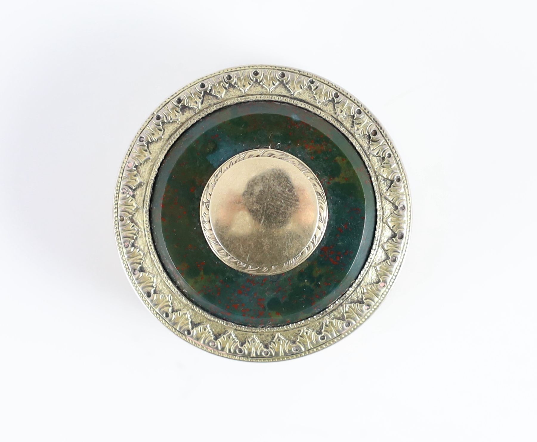 A George III engine turned silver gilt and inset bloodstone circular snuff box and cover, maker's mark rubbed